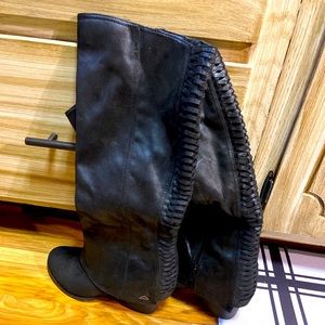 Tall black boots